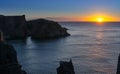 Dramatic sunrise cliffs at Cable John Cove Newfoundland. Daybreak over Atlantic ocean Royalty Free Stock Photo