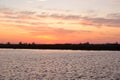 Dramatic sunrise in Dutch canal, Groningen, near Stroobos