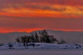 Dramatic sunrise on extremely cold winter morning