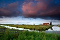 Dramatic sunrise over Dutch farmland