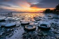 Dramatic sunrise at pollution beach.