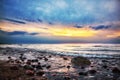 Dramatic sunrise on a rocky beach. Baltic sea Royalty Free Stock Photo