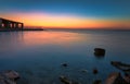 Dramatic sunrise with silky water view in Al uqair ruined fort sea side Saudi Arabia Royalty Free Stock Photo