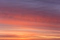 Dramatic sunrise, sunset orange pink violet sky with clouds background texture Royalty Free Stock Photo