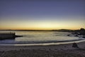 Sunset ocean view of Pacific Grove beach and Monterey Bay. Royalty Free Stock Photo