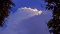 Blue sky with clouds and rainy clouds far away, Storm clouds gather over the town. Royalty Free Stock Photo