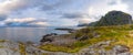 Dramatic sunset clouds moving over steep mountain peaks, Lofoten islands, Norway Royalty Free Stock Photo