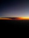 Dramatic sunset clouds from plane Royalty Free Stock Photo