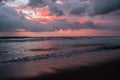 Dramatic sunset clouds reflected on the water sea. Tropical beach landscape Royalty Free Stock Photo