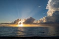 Dramatic sunset and cloudy sky. sea. Calm sea with cloudy sky through the clouds over. Sunset ocean and cloudy sky Royalty Free Stock Photo