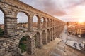 Dramatic sunset in famous Segovia aqueduct, Castilla y leon, Spain. Royalty Free Stock Photo