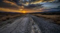 Stunning sunset view on a lonely road. landscape photo with dramatic sky. travel and nature concept. wide shot. tranquil Royalty Free Stock Photo