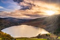 Dramatic sunset at Lake Lough Tay or The Guinness Lake in County Wicklow