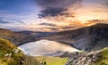 Dramatic sunset at Lake Lough Tay or The Guinness Lake in County Wicklow