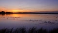 Dramatic sunset at a lake in Schleswig-Holstein, Germany