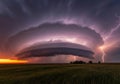 Dramatic sunset with lightning strike and storm cloud Royalty Free Stock Photo