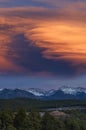 A dramatic sunset lights up the sky over the Sangre de Cristo Mountains.