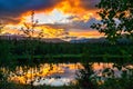 Dramatic sunset in the mountains. The light of the fading day, like a fire in the woods