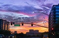 Dramatic sunset in North Scottsdale,Arizona. Cars drive by a busy intersection on Scottsdale rd and Kierland Blvd. Focus on road