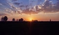 Dramatic sunset on the open field