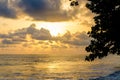 Dramatic sunset over Atlantic ocean with cloudy sky at Limbe, Cameroon, Africa