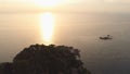 Dramatic sunset over beautiful sea coast with rocky beach. Shot. Composition of nature, beautiful fiery sunset sky on Royalty Free Stock Photo