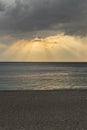 Dramatic sunset over cloudy sky and dark blue sea 3 Royalty Free Stock Photo