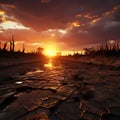 Dramatic sunset over cracked earth Royalty Free Stock Photo