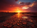 Dramatic sunset over cracked earth