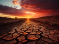 Dramatic sunset over cracked earth