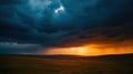 Dramatic Sunset Over Dark Clouds and Open Fields Royalty Free Stock Photo