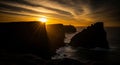 Dramatic sunset over dark, rugged sea cliffs with sun rays piercing through the clouds Royalty Free Stock Photo