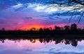 Dramatic Sunset over Lake Beautiful Water Reflection in Wilderness Forest Outdoors Afternoon Royalty Free Stock Photo