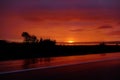 Dramatic sunset over Lake MÃÂ½vatn and the adjacent street, Iceland