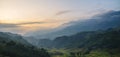 Dramatic sunset over mountain landscape. Beautiful landscape foggy hills twilight time. Blue golden sky sunrise dramatic beautiful Royalty Free Stock Photo