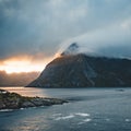 Dramatic sunset over the mountains and the sea of Lofoten islands in Norway Royalty Free Stock Photo