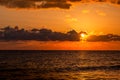 Dramatic sunset over ocean. Sky with clouds Royalty Free Stock Photo