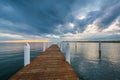 Dramatic sunset over a pier in the Chesapeake Bay, in Kent Island, Maryland Royalty Free Stock Photo