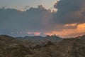 Dramatic Sunset over Red Sea Hills mountain chain and Sahara desert. Sun already behind horizon line, close up photo. Hurghada, Royalty Free Stock Photo