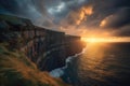 dramatic sunset over a rugged coastal cliff, with the sun peeking out from behind the clouds Royalty Free Stock Photo