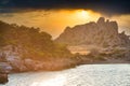 Dramatic sunset over sea and mounains, Sterna beach, Peloponessos, Greece Royalty Free Stock Photo