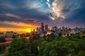 Dramatic sunset over Seattle skyline with highway in foreground Royalty Free Stock Photo