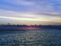 Dramatic sunset over the water on Cuban beach Royalty Free Stock Photo