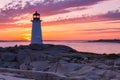 A dramatic sunset at Peggy\'s Cove Lighthouse, Halifax, Nova Scotia, Canada