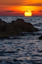 Dramatic sunset with rocky coast, Sardinia