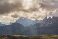 Dramatic scenery in the Dolomite Alps, Italy, in summer, with storm clouds and majestic peaks Royalty Free Stock Photo