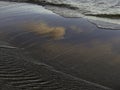 Dramatic sunset, seashore, strong winds and blurred waves, Royalty Free Stock Photo