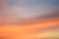 Dramatic sunset sky background with fiery clouds, yellow, orange and pink colour, nature background Royalty Free Stock Photo