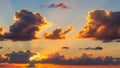 Dramatic Sunset Sky with Golden Clouds and Sun Rays Breaking Through Dark Cumulus Formations Royalty Free Stock Photo