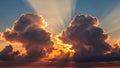 Dramatic Sunset Sky with Large Cumulus Clouds and Sun Rays Breaking Through Creating a Powerful Atmospheric Scene Royalty Free Stock Photo